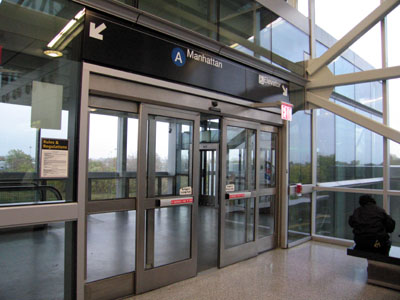 Through the AirTrain turnstile to the Manhattan A train