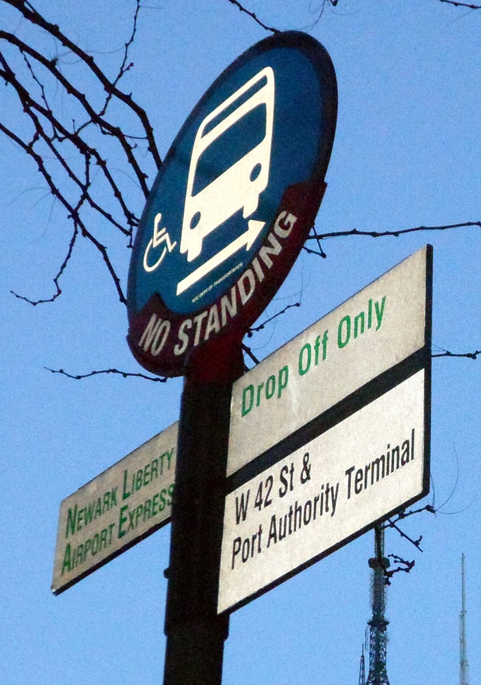 Newark Airport Express drop-off sign on 42nd St